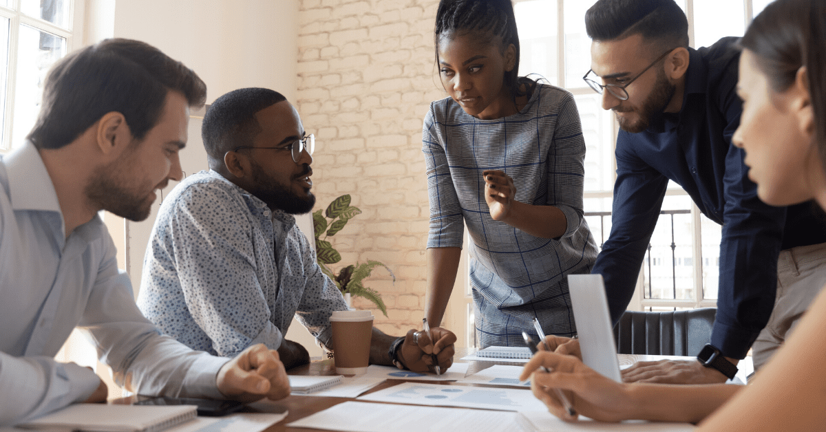 Customer success team brainstorms for online community migration