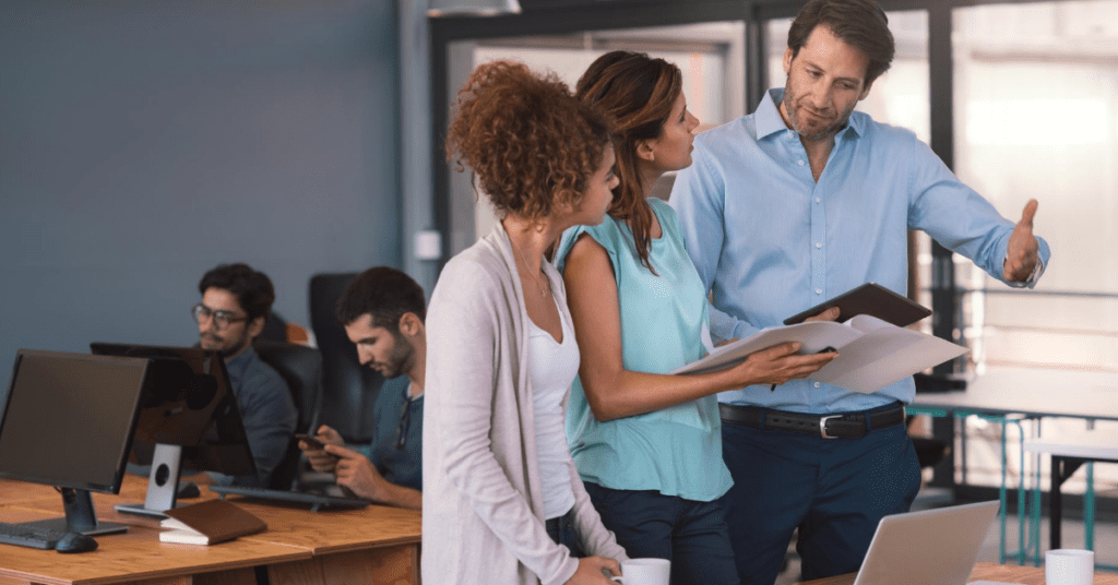 Team reviewing crowdsourcing ideas